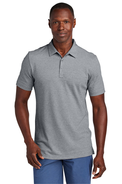 Man wearing a gray polo shirt and blue pants on a white background, Embroidered TravisMathew Sunnyvale Polo