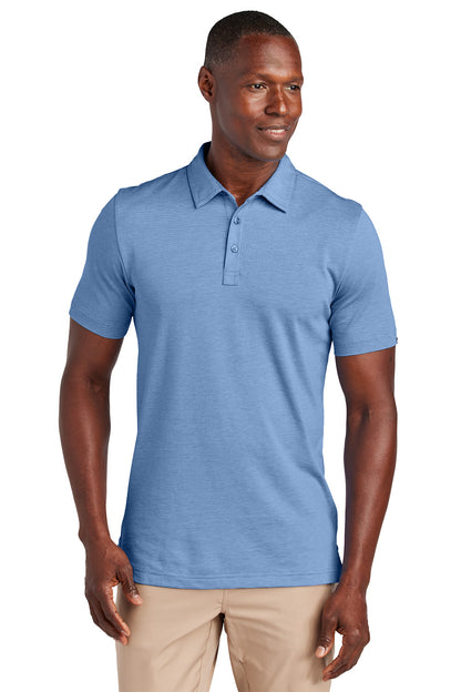 Man wearing a blue polo shirt on a white background, Embroidered TravisMathew Sunnyvale Polo