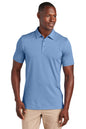 Man wearing a blue polo shirt on a white background, Embroidered TravisMathew Sunnyvale Polo