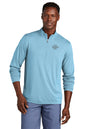 Man wearing a light blue pullover with a logo on a white background, embroidered TravisMathew Coto Performance 1/4-Zip
