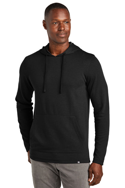 Man wearing a black hoodie on a white background TravisMathew Coveside Hoodie, Embroidered
