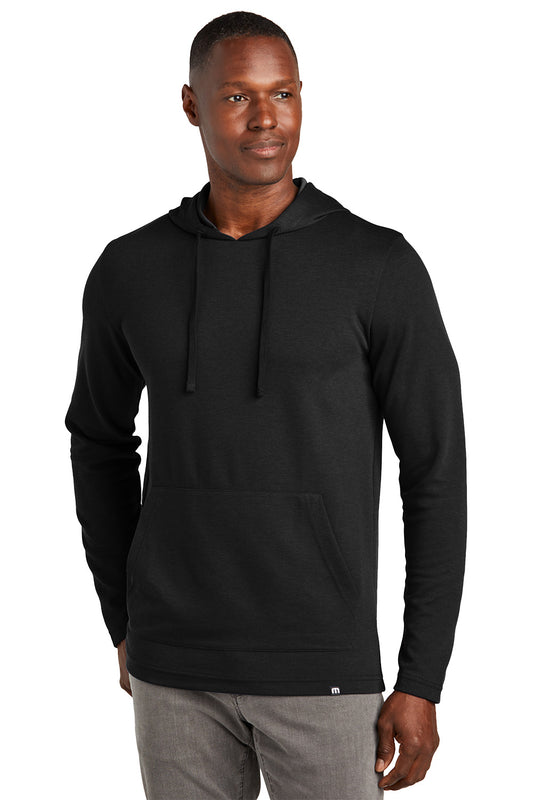 Man wearing a black hoodie on a white background TravisMathew Coveside Hoodie, Embroidered