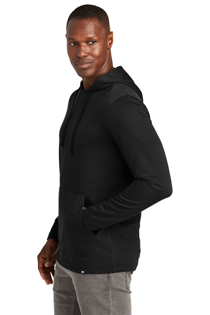 Man wearing a black hoodie on a white background TravisMathew Coveside Hoodie, Embroidered