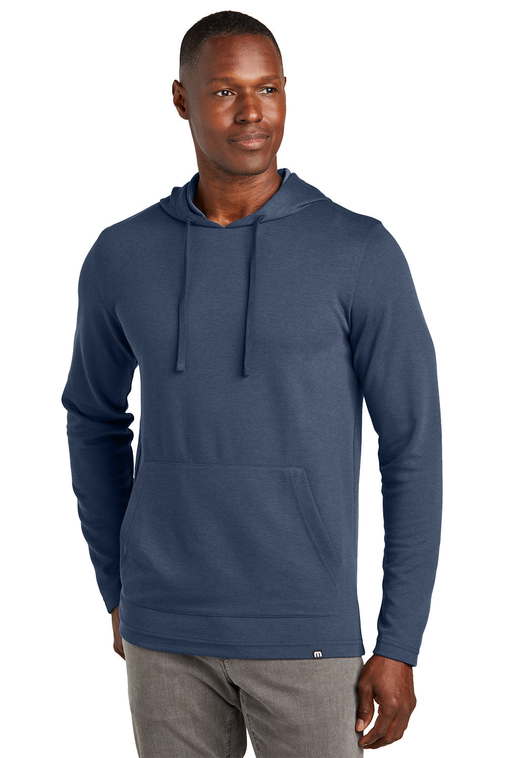 Man wearing a blue hoodie on a white background TravisMathew Coveside Hoodie, Embroidered
