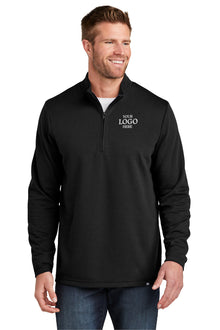 Man wearing a black quarter-zip pullover with customizable text on a white background TravisMathew Coveside 1/4-Zip, Embroidered