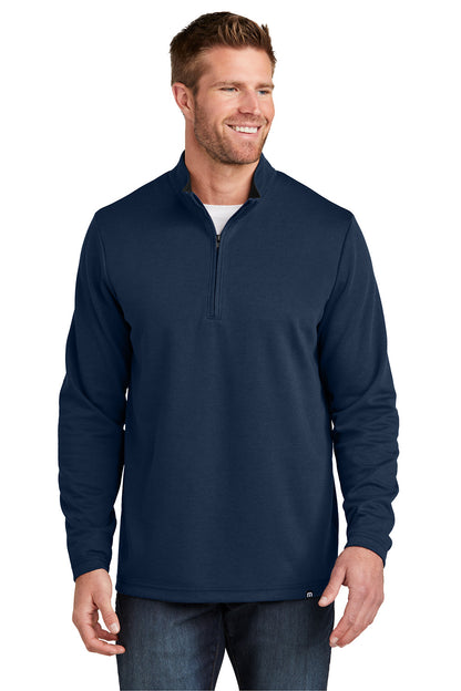 Man wearing a navy blue pullover with a white background TravisMathew Coveside 1/4-Zip, Embroidered
