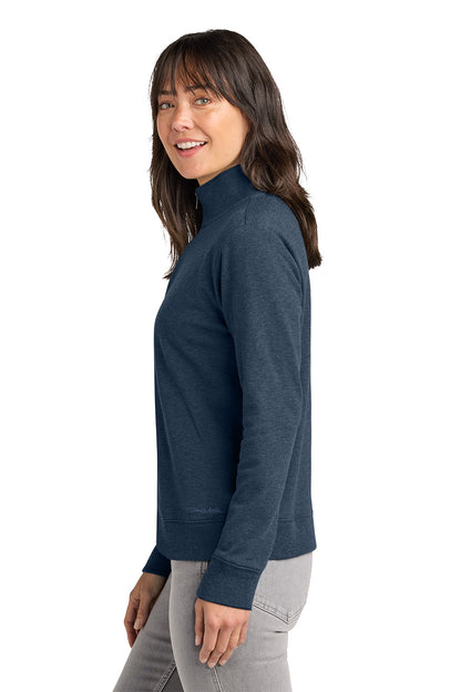 Woman wearing a dark gray turtleneck sweater on a white background. TravisMathew Women's Ocean Villa 1/4-Zip, Embroidered