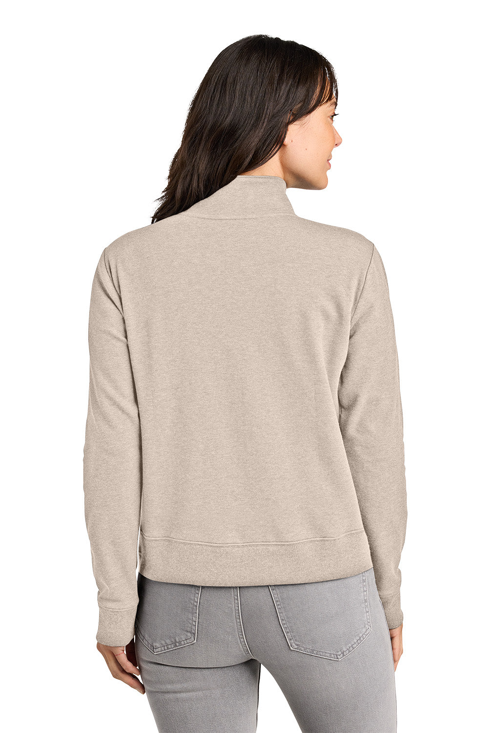 Woman wearing a beige jacket and gray pants on a white background. TravisMathew Women's Ocean Villa 1/4-Zip, Embroidered