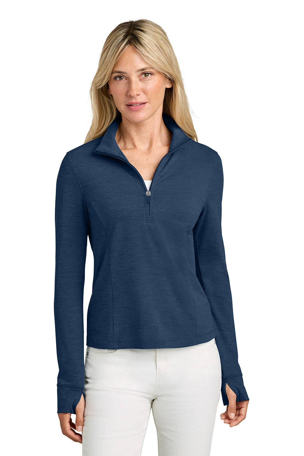 Woman wearing a blue long-sleeve shirt with a quarter zip on a white background. TravisMathew Women’s Onward 1/2-Zip, Embroidered