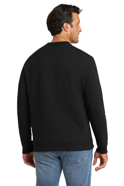 Man wearing a black sweatshirt and blue jeans on a white background, embroidered Volunteer Knitwear™ Chore Fleece Crewneck