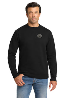 Man wearing a black sweatshirt with 'YOUR LOGO' text on a white background, embroidered Volunteer Knitwear™ Chore Fleece Crewneck