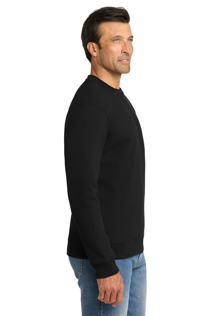 Man wearing a black sweatshirt and blue jeans on a white background, embroidered Volunteer Knitwear™ Chore Fleece Crewneck