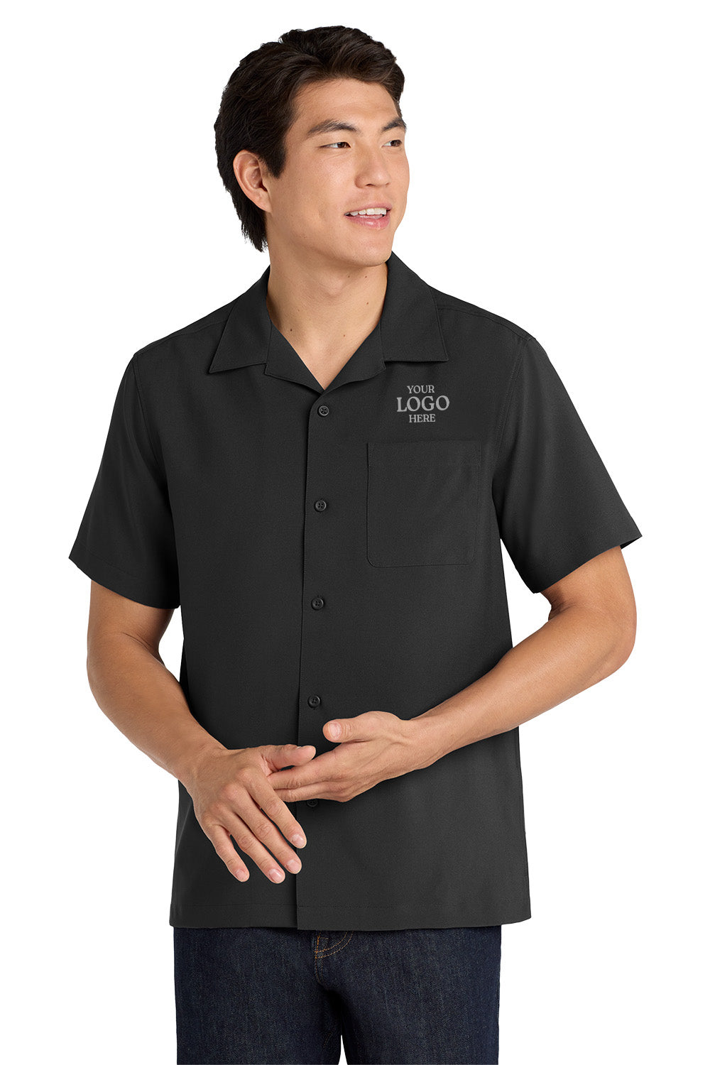 Man wearing a black polo shirt with a logo on a white background embroidered Port Authority ® Short Sleeve Performance Staff Shirt