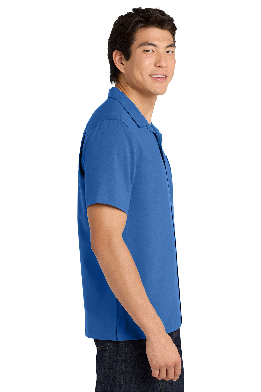 Man wearing a blue polo shirt on a white background embroidered Port Authority ® Short Sleeve Performance Staff Shirt