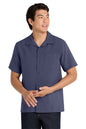 Man wearing a navy blue short-sleeve shirt on a white background embroidered Port Authority ® Short Sleeve Performance Staff Shirt