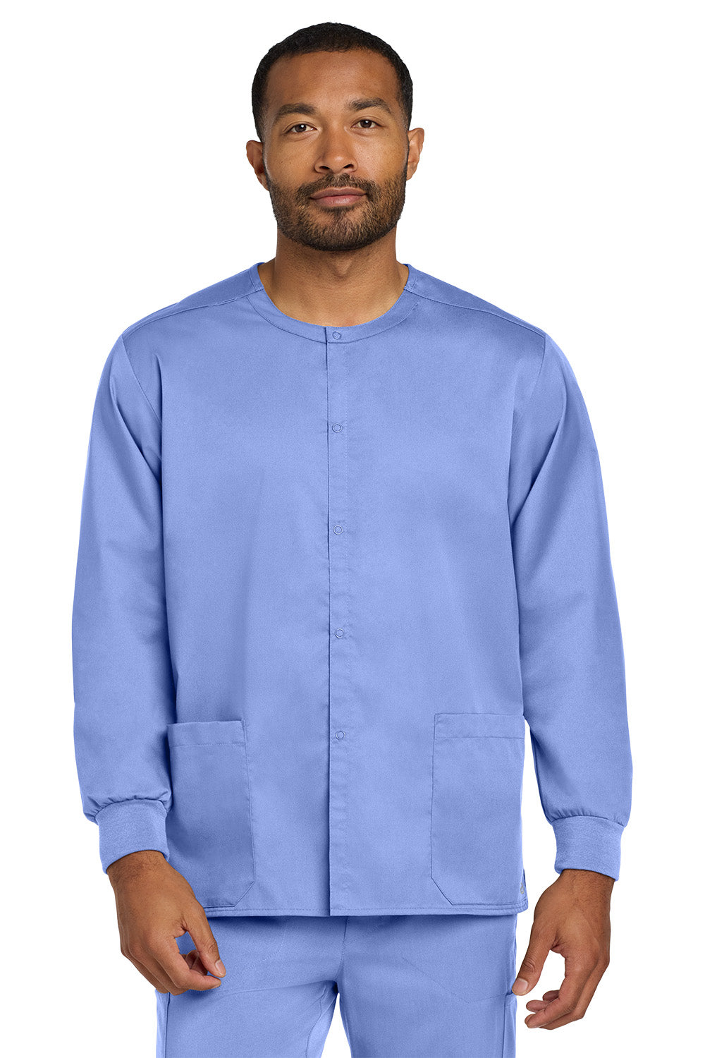 Man wearing a blue scrub set on a white background Wink® Unisex WorkFlex Snap-Front Scrub Jacket, Embroidered