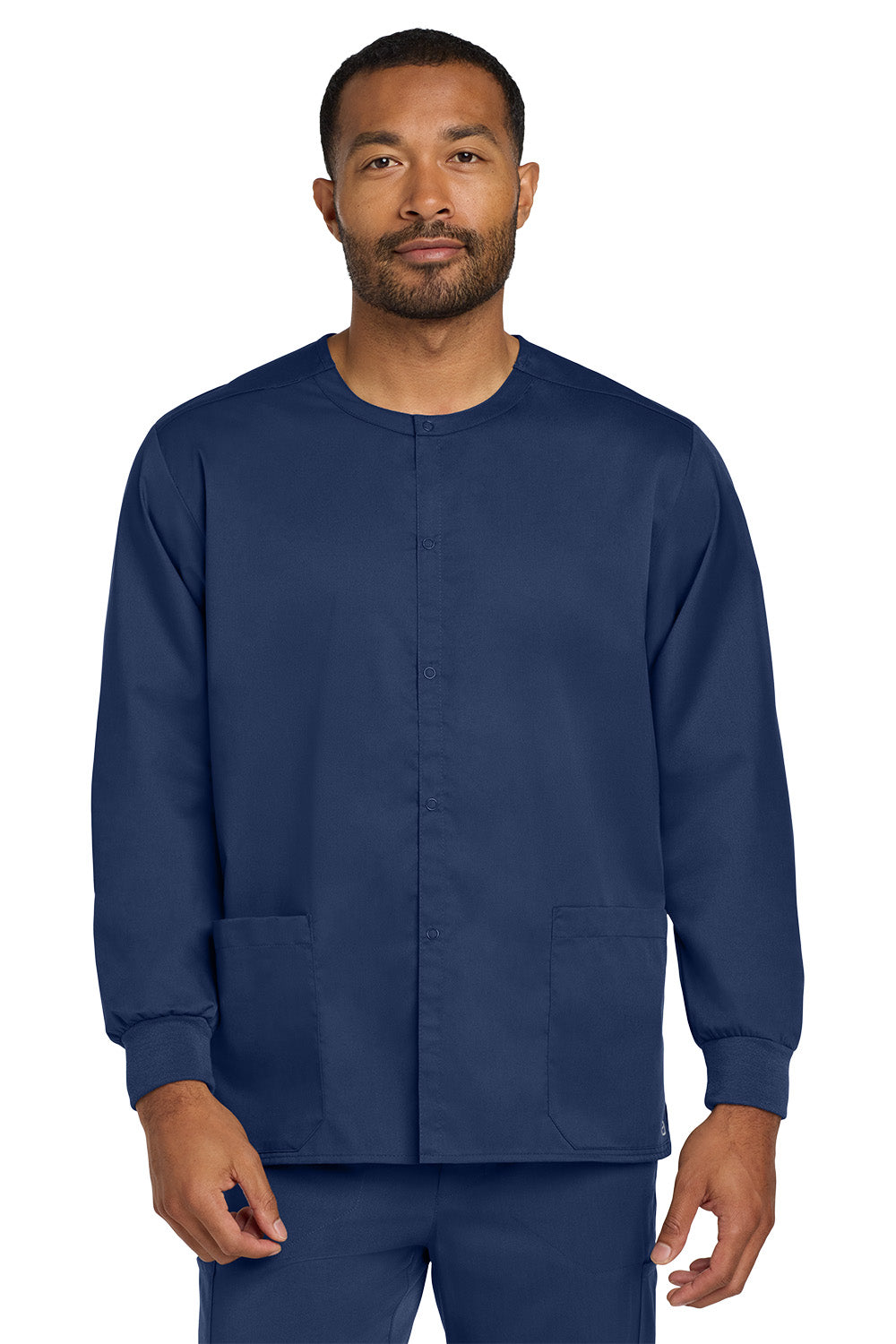 Man wearing a navy blue scrub top on a white background Wink® Unisex WorkFlex Snap-Front Scrub Jacket, Embroidered