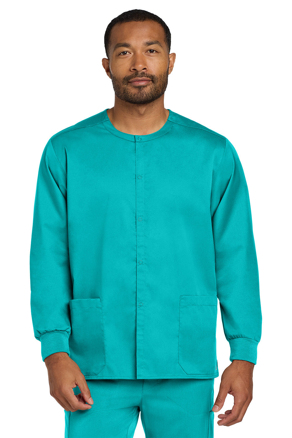 Man wearing a teal scrub set on a white background Wink® Unisex WorkFlex Snap-Front Scrub Jacket, Embroidered