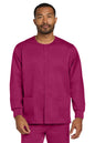 Man wearing a magenta scrub set on a white background Wink® Unisex WorkFlex Snap-Front Scrub Jacket, Embroidered