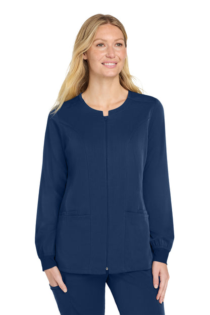 Woman wearing a navy blue scrub top on a white background Wink® Women’s Premiere Flex™ Full-Zip Scrub Jacket, Embroidered