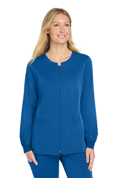 Woman wearing a blue scrub top on a white background Wink® Women’s Premiere Flex™ Full-Zip Scrub Jacket, Embroidered