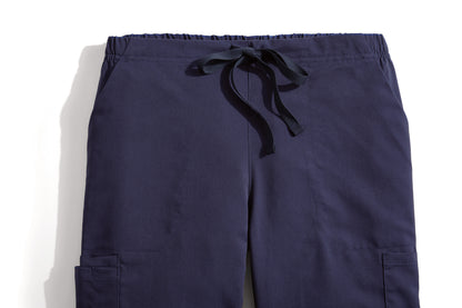 Navy blue pants with a drawstring on a white background Wink® Women’s Premier Flex Cargo Pant jogger