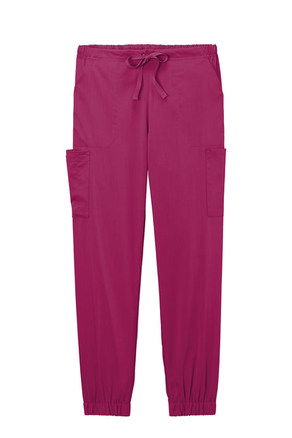 Pink jogger pants with drawstring on a white background Wink® Women’s Premier Flex Cargo Pant jogger