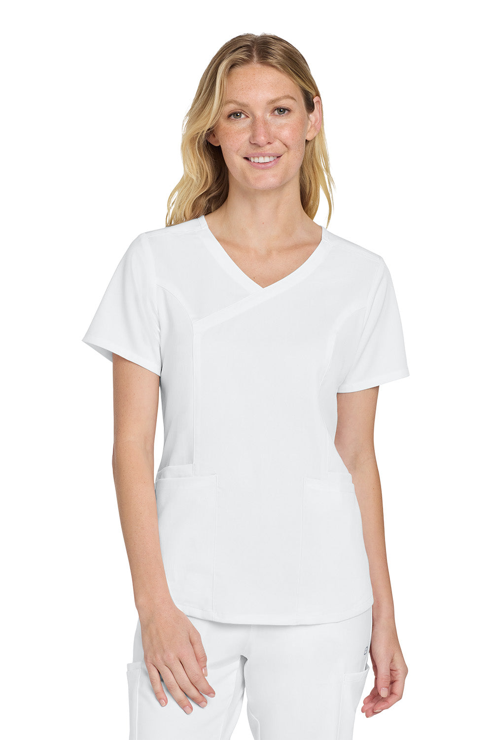Woman wearing a white V-neck t-shirt and pants on a white background Wink® Women’s Premiere Flex™ Top, Embroidered