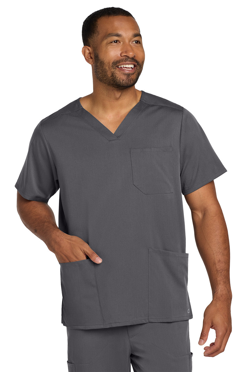 Man wearing a gray scrub set on a white background Wink® Men's Premiere Flex™ V-Neck Top