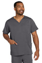 Man wearing a gray scrub set on a white background Wink® Men's Premiere Flex™ V-Neck Top