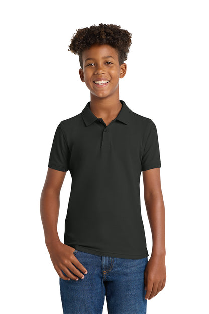 Person wearing a black polo shirt and blue jeans on a white background. Port Authority® Youth Core Classic Pique Polo, Embroidered by Helmsman Stitch Co.