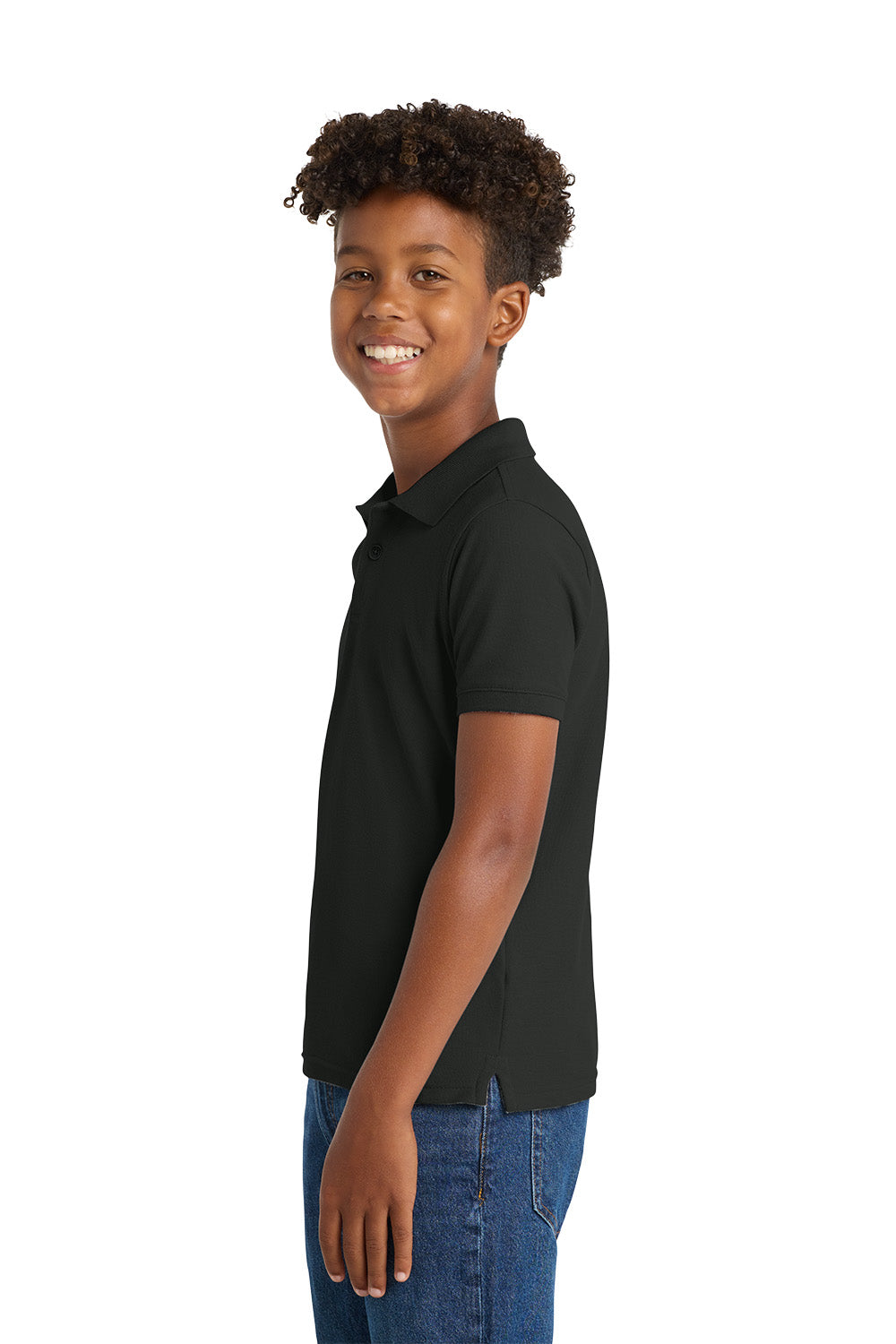 Person wearing a black polo shirt and blue jeans on a white background. Port Authority® Youth Core Classic Pique Polo, Embroidered by Helmsman Stitch Co.
