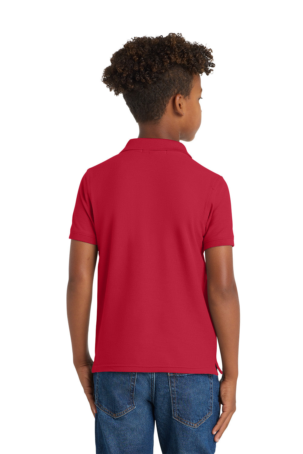 Child wearing a red polo shirt on a white background. Port Authority® Youth Core Classic Pique Polo, Embroidered by Helmsman Stitch Co.