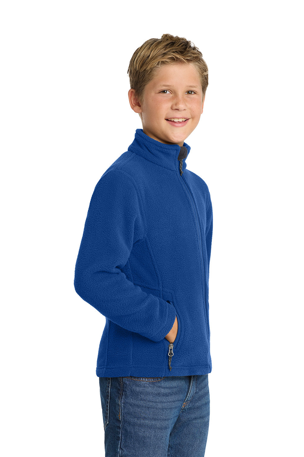 Young boy wearing a blue fleece jacket on a white background. Port Authority® Youth Value Fleece Jacket, Embroidered by Helmsman Stitch Co.