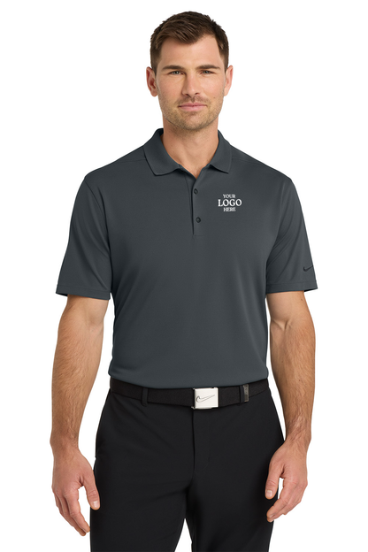 Man wearing a dark gray polo shirt with 'nationalgrid' logo on a white background. Nike Dri-FIT Micro Pique 2.0 Polo, Embroidered by Helmsman Stitch Co.