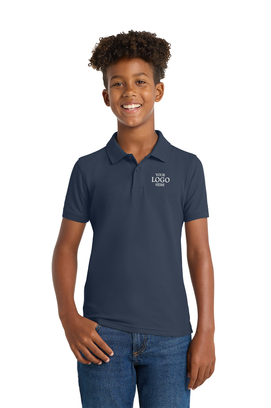 Person wearing a navy polo shirt with a logo on a white background. Port Authority® Youth Core Classic Pique Polo, Embroidered by Helmsman Stitch Co.